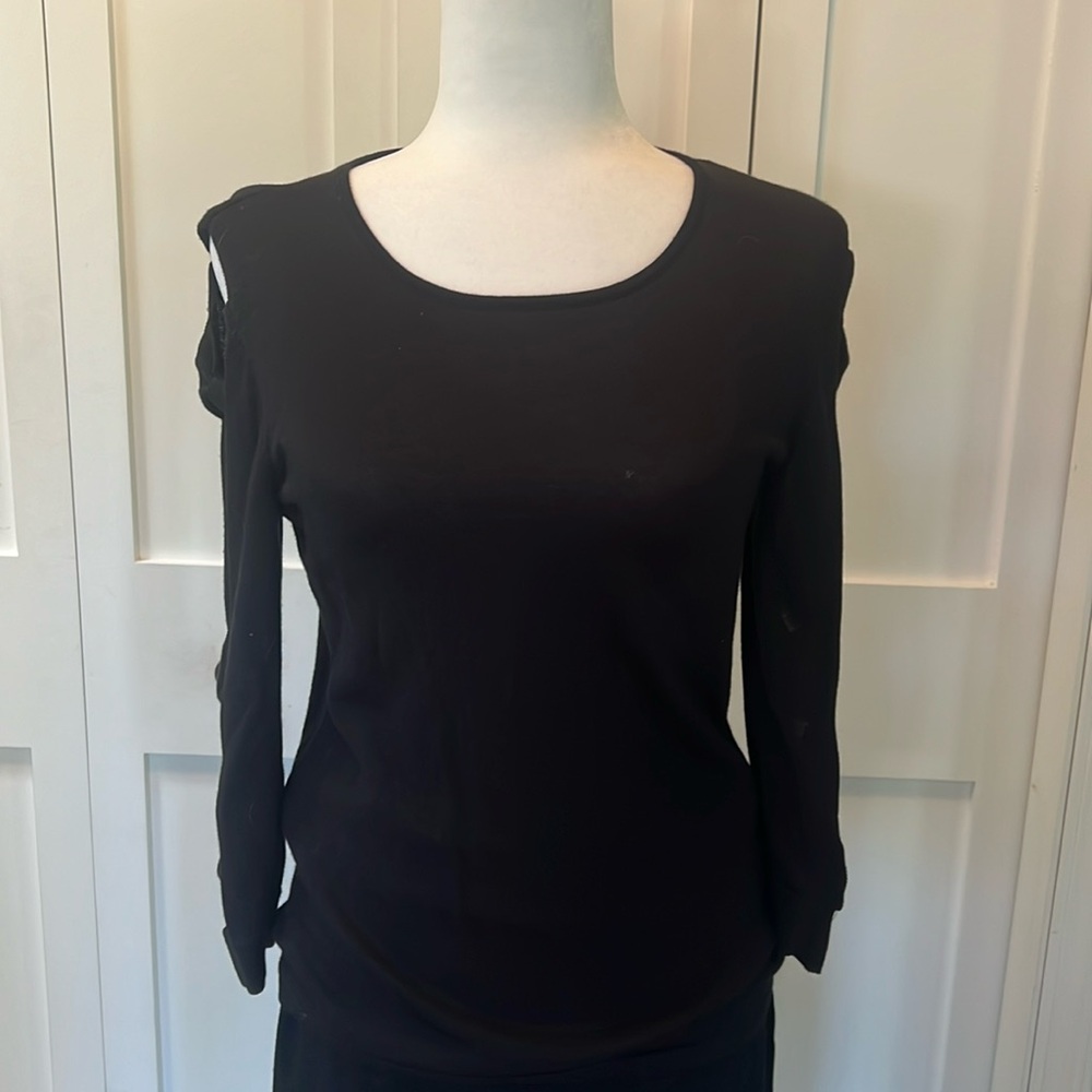 Black CeCe sweater with bows on arms